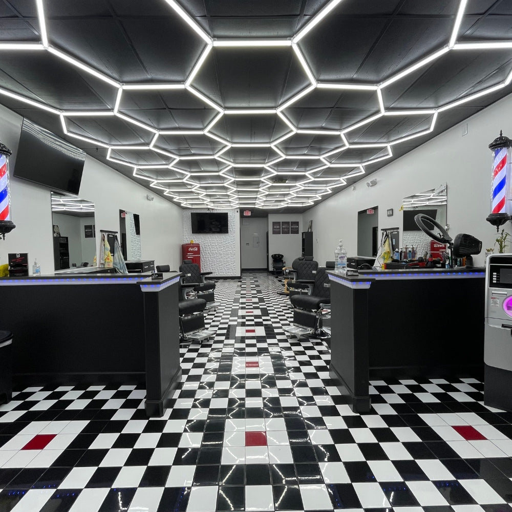 Beauty salon featuring hexagon LED grid lights on the ceiling, creating a sophisticated and well-lit environment